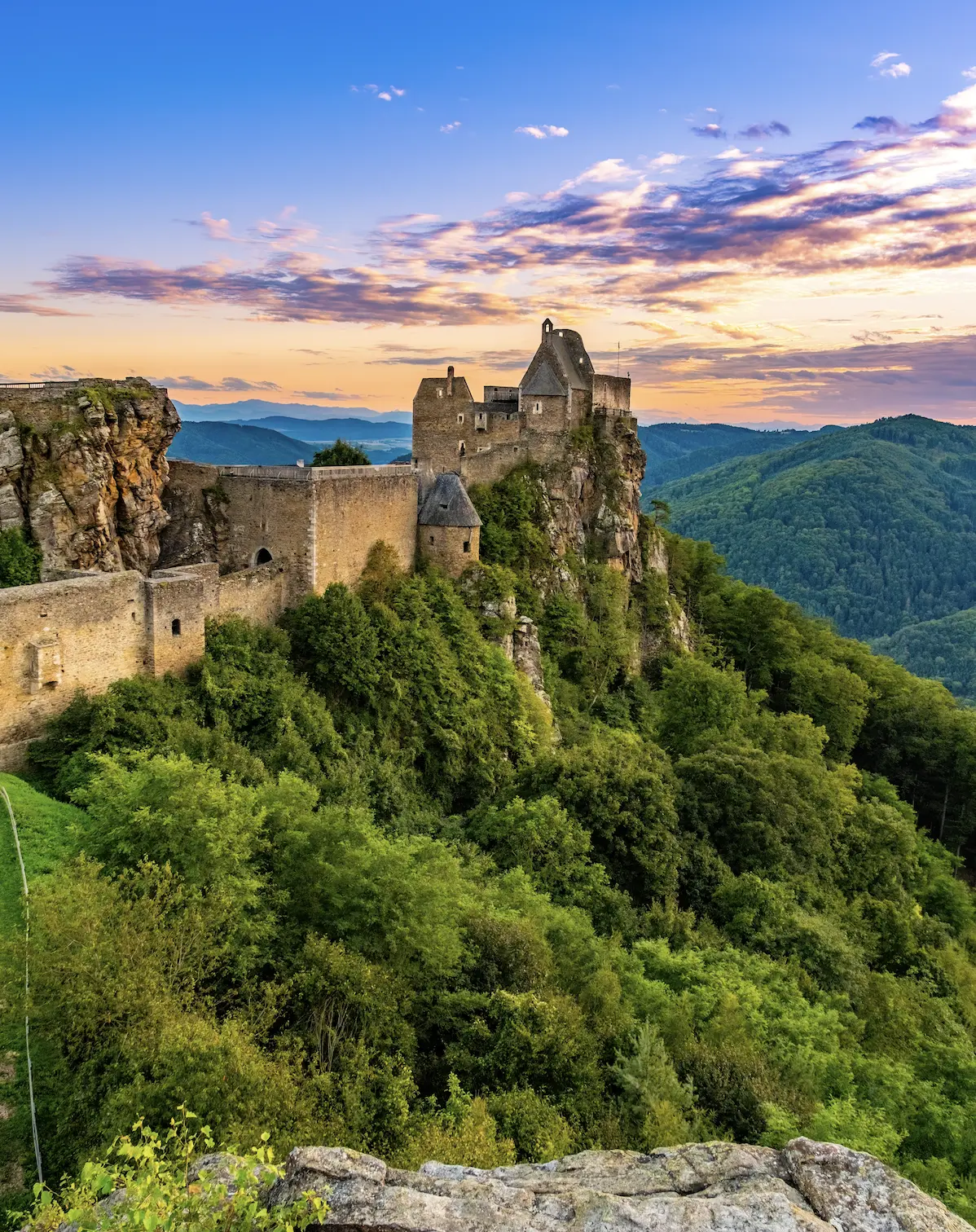 The Wachau Valley is an Austrian region known for its rolling hills vineyards and fortresses.